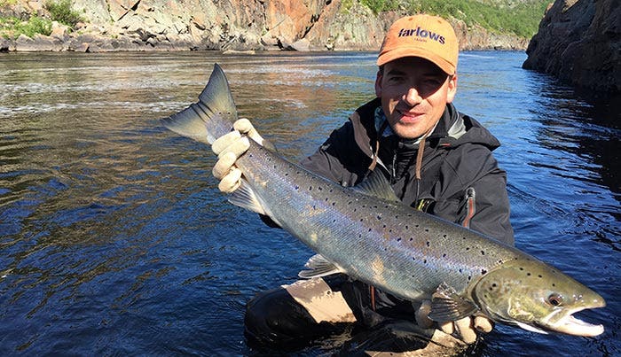 A fish taken on the hitch from the Kharlovka river in Russia. Note the 'glidey' glassy water in the background - a good place to try the hitch