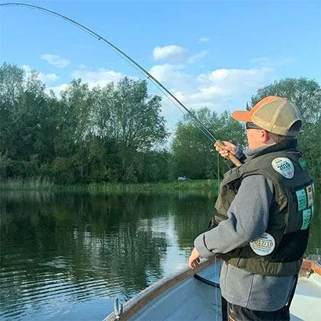 James Penwright Fly Fishing from a Boat on Haywards Farm Lake at the Sportfish Game Fishing Centre