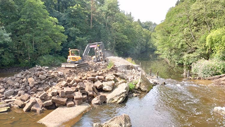 Scotton weir during restoration work Scotton weir before