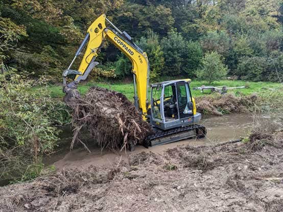 Moving a root wad into position Bourne Rivulet