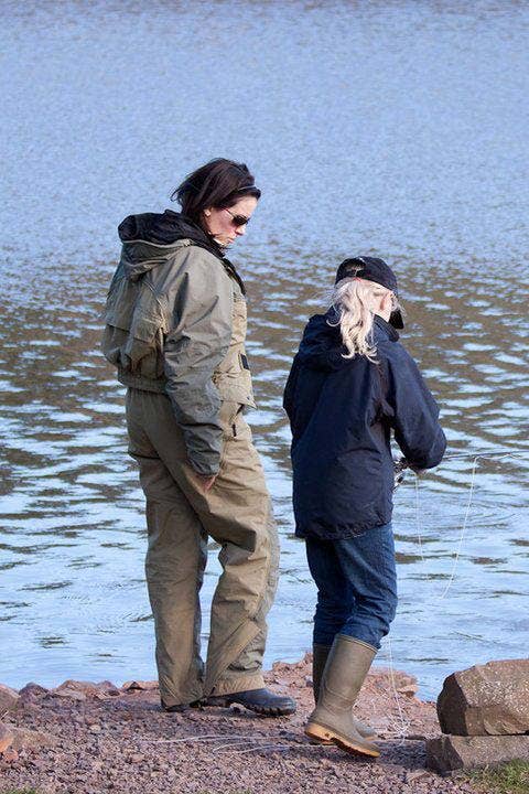 Lucy Coaching Young Angler Ruby