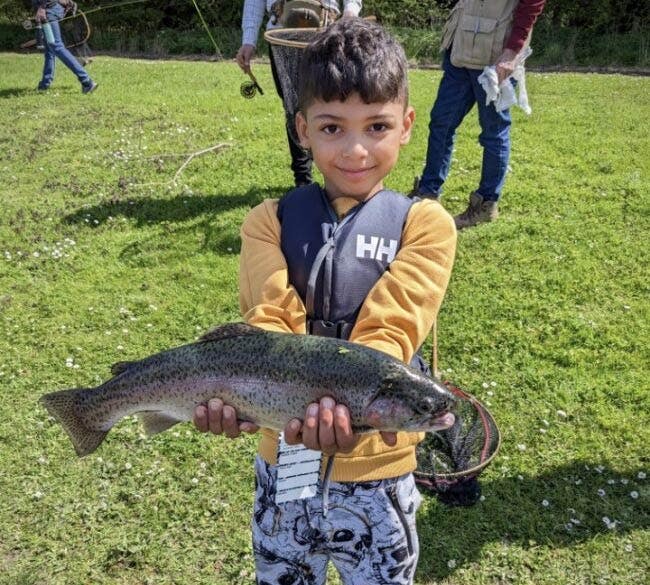 Mentee Lovelle, With His First Trout, Holding The Fish