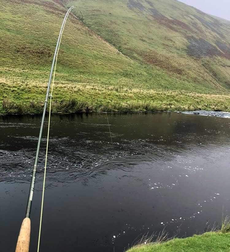 Hugh into another one Hugh into another one, rod bent, fighting the fish