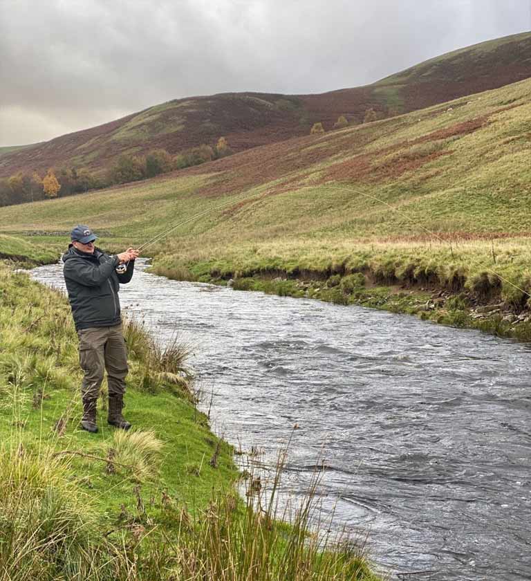 And me into my third salmon, stood river side with fish on the hook pulling