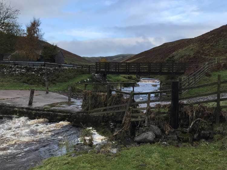 The ford at the bottom of the burn after the spate – you can see from the debris on the railings how high the water rose the previous day